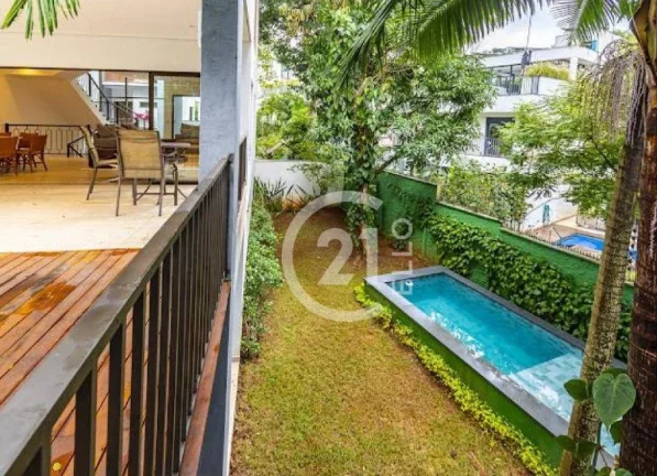 Imagem Casa em condomínio, 4 suítes, 690 m²