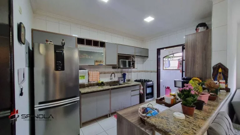 Imagem Apartamento com 2 dormitórios à venda, 77 m² por R$ 362.000,00 - Caiçara - Praia Grande/SP