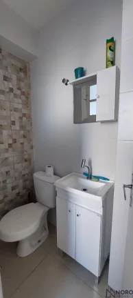 Imagem Apartamento com 2 dormitórios + dependência completa e 1 vaga de garagem na Andr