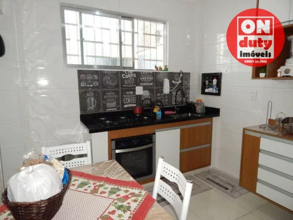 Imagem Casa com 2 dormitórios à venda, 73 m² por R$ 320.000,00 - Areia Branca - Santos/SP