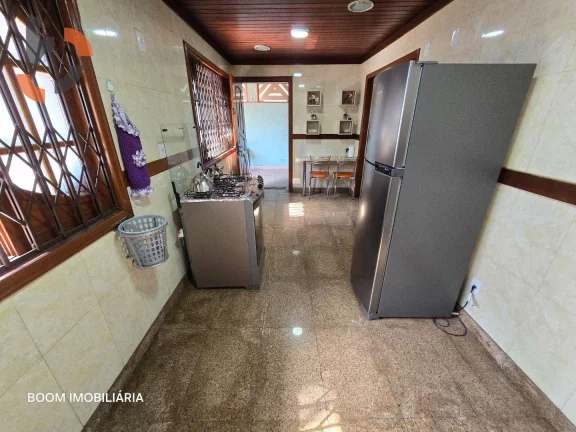 Imagem Casa com 4 dormitórios à venda, 243 m² por R$ 880.000,00 - Caonze - Nova Iguaçu/RJ