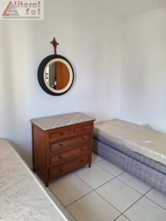 Imagem Apartamento para locação em Praia Grande-SP, Tupi: 2 quartos, 1 suite, 1 sala, 2 banheiros, 1 vaga de garagem.