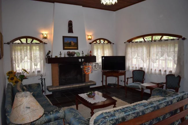 Imagem Casa com 3 dormitórios à venda, 292 m² por R$ 1.500.000 - Vila Inglesa - Campos do Jordão/SP