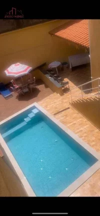 Imagem Belíssima casa térrea com piscina - 3 dorms. 160m².
