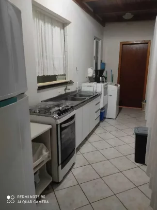 Imagem Apartamento com 2 dormitórios sendo 1 suíte e 1 vaga de garagem em Itapema/SC