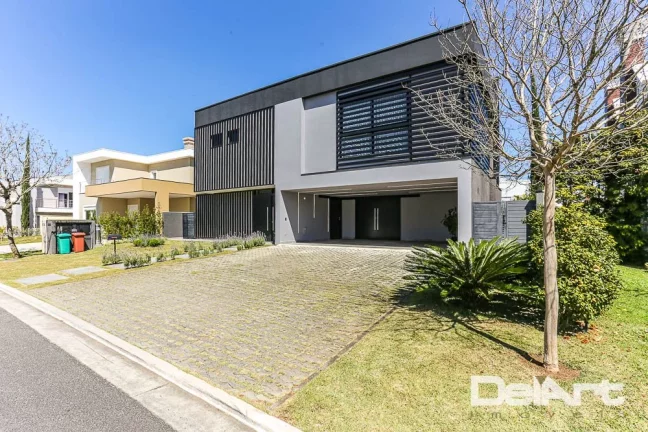 Imagem Residência Alto Padrão - 5 Suítes, Piscina e ELEVADOR no Alphaville Graciosa – 500m² de Sofisticação… Um verdadeiro espetáculo!!!