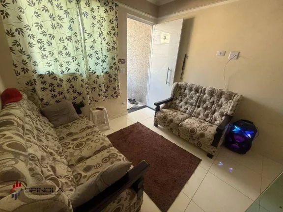 Imagem Sobrado com 2 dormitórios à venda, 56 m² por R$ 375.000,00 - Maracanã - Praia Grande/SP