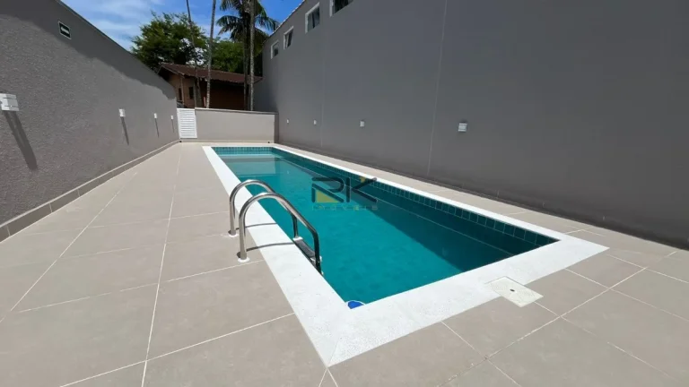 Imagem APARTAMENTO A VENDA NO PEREQUE AÇU COM SALA 2 AMBIENTES,VARANDA GOURMET COM CHURRASQUEIRA E 2 DORMITÓRIOS
