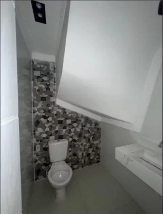 Imagem Sobrado com 2 dormitórios à venda, 53 m² por R$ 340.000,00 - Boqueirão - Praia Grande/SP