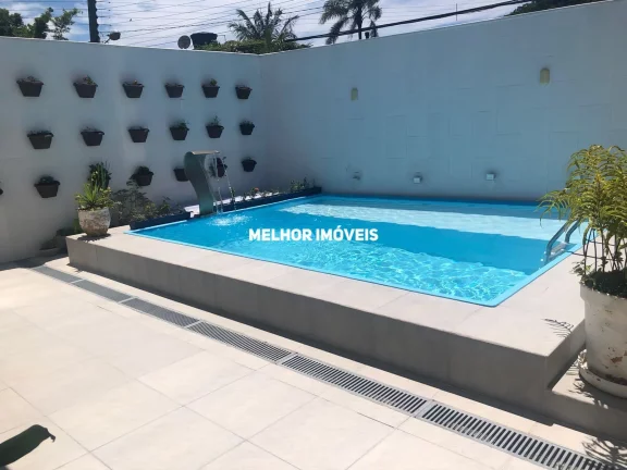 Imagem Casa Alto Padrão a venda em Condominio Fechado com 04 suítes e 03 vagas.