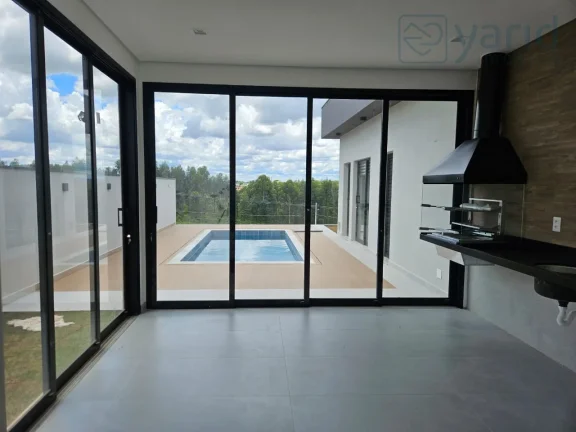 Imagem Imperdível! Sobrado de alto padrão em condomínio luxuoso no Ibi Aram 2, com 3 suítes, 4 vagas e 195m². Confira já!