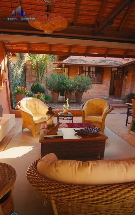 Imagem CASA TÉRREA ESTILO NORMANDO, 4 SUÍTES, TERRENO 1.107m², COND. NA GRANJA