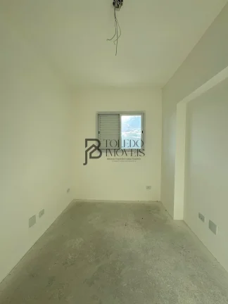 Imagem Apartamento de 2 dormitórios sendo 1 suíte, prédio frente mar no bairro Vila Mirim - Praia Grande