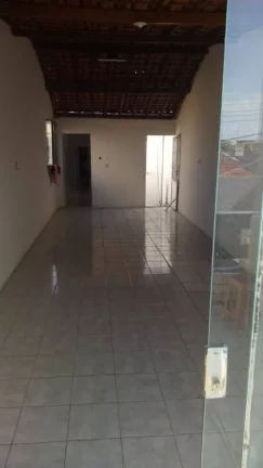 Imagem Casa no Centro - 4 Quartos, 2 Suítes, 200m², 4 Vagas de Garagem - Consulte Agora!