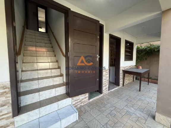 Imagem Casa semimobiliada no Gravatá com 5 dormitórios, sendo 1 suíte com 336m² de terreno a venda pela Imobiliária Adriano Carpes