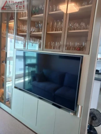 Imagem Imperdível apartamento de 2 quartos e 2 suítes no bairro Tupi em Praia Grande-SP, com 90,30m² e vaga de garagem!