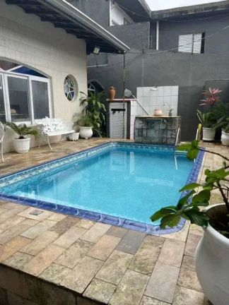 Imagem Casa com 3 dormitórios à venda, 166 m² por R$ 1.200.000,00 - Tupi - Praia Grande/SP