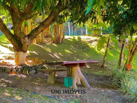 Imagem Chácara com 10 suítes e Cachoeira a venda, 9.104M² na zona rural de Guarapari.