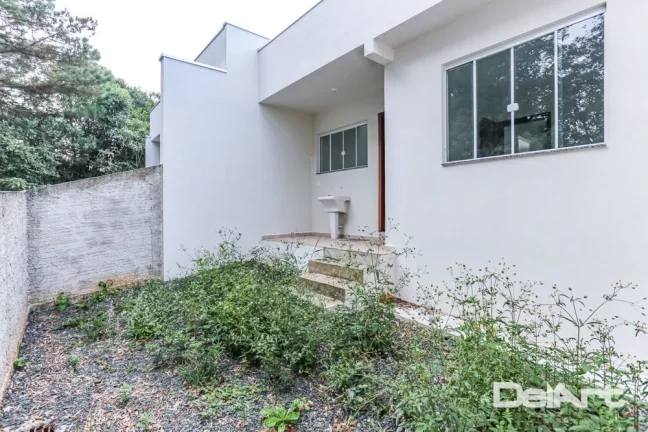 Imagem Casa térrea (geminada) - R$ 259.000,00 - Novinha - 61,02m2 - Bairro Bom Jesus/Rio Negro-Pr.