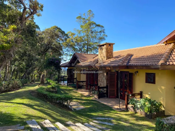 Imagem Casa à venda em Campos do Jordão – Linda casa com 7 suítes