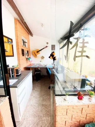 Imagem Sobrado com 165 m² 3 Dormitorios sendo 2 Suites 2 Vagas de Garagens