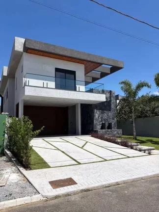 Imagem Casa alto padrão em condomínio com 4 suítes e 4 vagas de garagem em Camboriú/SC