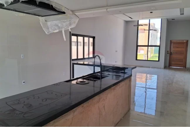 Imagem Casa em condomínio fechado com três quartos, sendo uma suíte