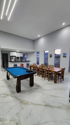 Imagem Casa de alto padrão com 4 suítes em conjunto residencial com controle de acesso