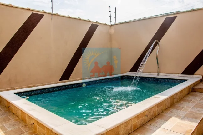 Imagem OPORTUNIDADE ÚNICA! CASA TÉRREA COM PISCINA A 1200M DO MAR - LADO PRAIA