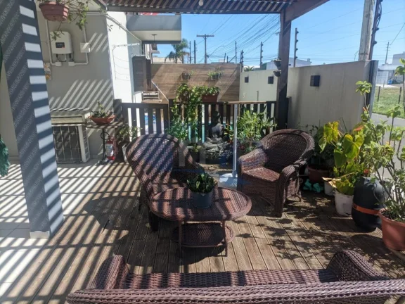 Imagem Sobrado á venda com 3 dormitórios na Stan em Torres/RS