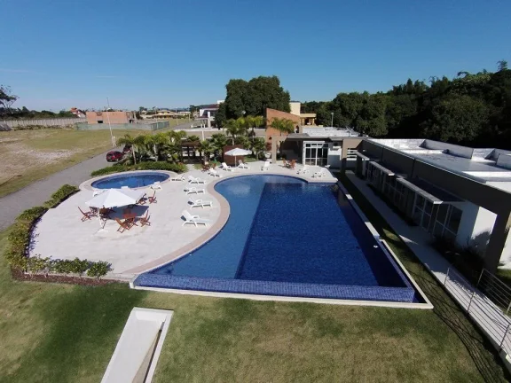 Imagem Terreno à venda em Imbituba - Condomínio fechado com piscina, quadra poliesportiva acesso para lagoa