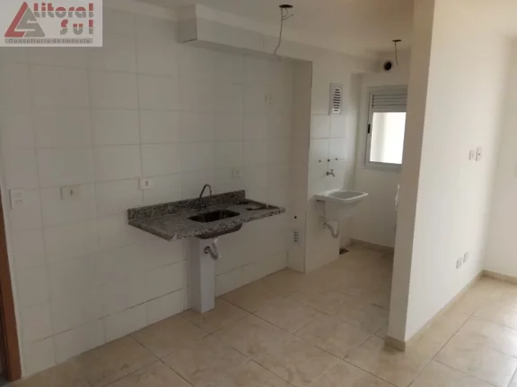 Imagem Apartamento à venda na Guilhermina, Praia Grande-SP: 2 quartos, 1 suíte, 1 vaga de garagem e 56m² de área. Adquira já!