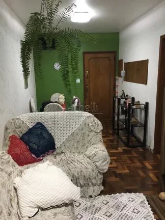 Imagem Apartamento com 70M², 2 dormitórios, cozinha, área de serviços, sala e 1 banheiro. Apartamento c...