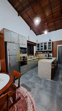 Imagem Casa Elegante com 4 Dormitórios a 700 metros da praia de Massaguaçu.