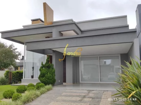 Imagem Excelente Casa no Condomínio Capão Ilhas! Estilo Contemporânea, mobiliada e decorada, composta por 03 suítes