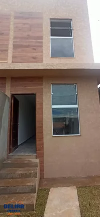 Imagem Casa em Terra Preta, Modelo Geminada, aceita financiamento.