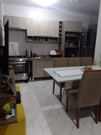 Terreno com 2 Sobrados, meio lote, com suíte