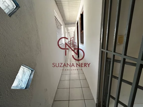 Imagem Prédio comercial com uma casa, 2 lojas e 11 kitinets