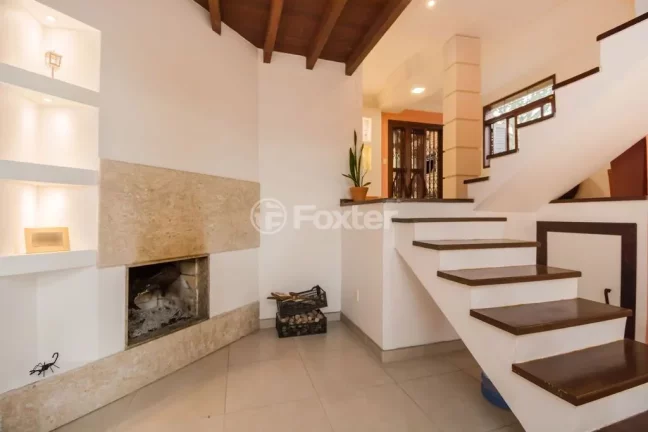 Imagem Casa em Condomínio 3 dorms à venda Avenida Vicente Monteggia, Cavalhada - Porto Alegre