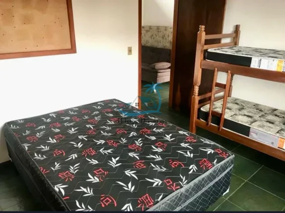 Imagem Sobrado com 4 dormitórios sendo 3 suítes e 1 banheiro social a venda no Itaguá em Ubatuba.