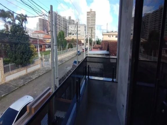 Imagem Sobrado com 2 dormitórios à venda, 77 m² por R$ 350.000,00 - Caiçara - Praia Grande/SP