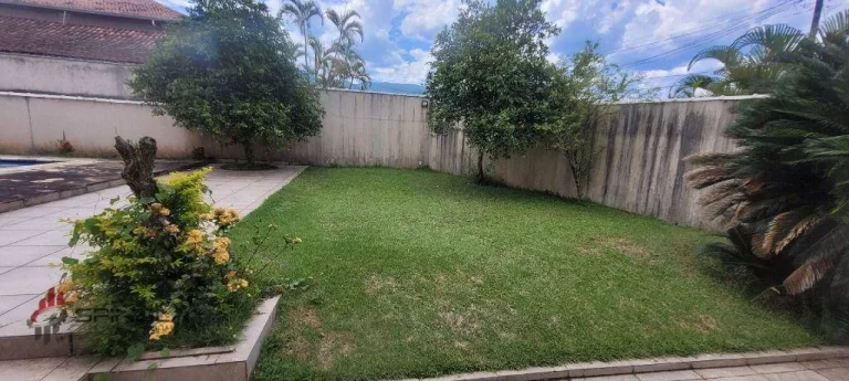 Imagem Sobrado com 4 dormitórios à venda, 180 m² por R$ 1.280.000,00 - Solemar - Praia Grande/SP
