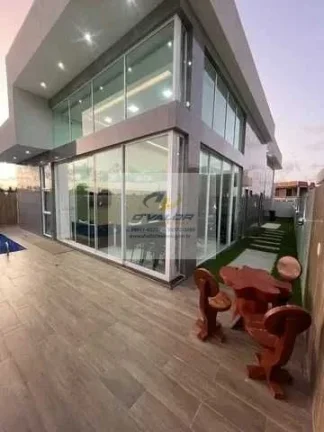 Imagem Vendo casa em condomínio fechado, com 250m², sala para 3 ambientes, 3 suítes, escritório e 4 vagas