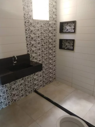 Imagem Casa à Venda no Bairro Farolândia - 4 Quartos, 2 Vagas de Garagem