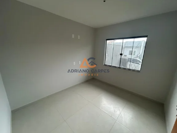 Imagem Casa Geminada - 2 dormitórios, sendo 1 suíte e uma vaga de garagem. Localizado no bairro Itajuba - Barra Velha - Adriano Carpes Imóveis vende