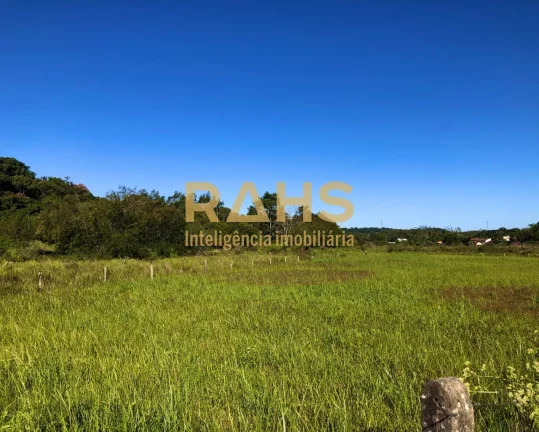 Imagem Excelente terreno urbano, em rua principal e asfaltada, faixa viária, localizado no bairro Rio Boni...