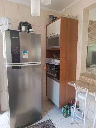 Imagem Sobrado com 2 dormitórios à venda, 79 m² por R$ 318.000 - Oceanópolis - Mongaguá/SP