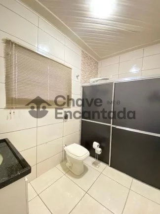 Imagem Casa no centro com quintal amplo e varanda coberta