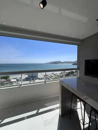 Imagem Apartamento vista mar com 2 suítes e 3 vagas de garagem em Balneário Perequê