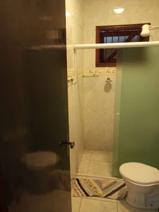Imagem Casa com 2 dormitórios à venda, 72 m² por R$ 450.000 - Caiçara - Praia Grande/SP